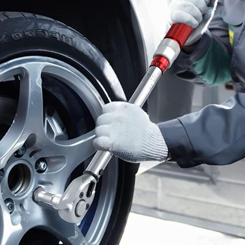 Intervention sur une opération de montage et équilibrage de pneumatique neuf.